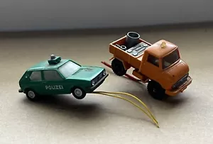 Wiking H0 Modelle / 1:87 / VW Golf 1 Polizei & Unimog 411 *mit Beleuchtung* - Bild 1 von 8