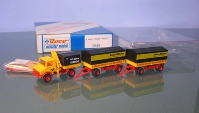 █► Unimog + 2 Anh. MAZ Auto Album VF Fiedler Wg. 15+18 Roco 1:87 OVP TOP! - Bild 1 von 3