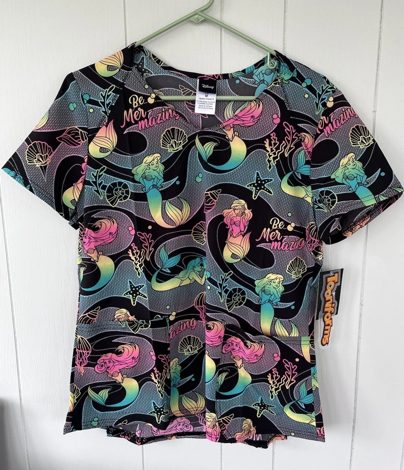 NWT Women’s Small Disney Little Mermaid Print Scrub Top - Image 1 of 1