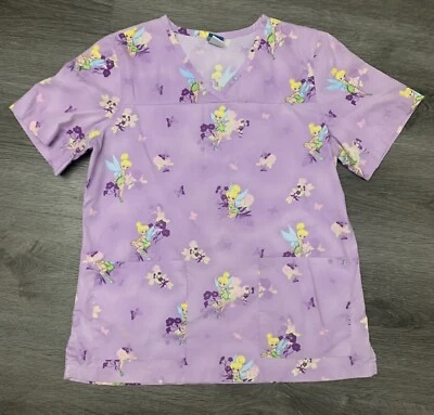 Blusa Médica Disney TINKERBELL Fairy con Flores Púrpura Para Mujer Talla Mediana Foto 1 de 4