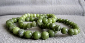 Armband aus Nephrit-Jade - Kugeln Ø ~6.5/8.5mm / ~15.5-23 cm Weite - elastisch - Picture 1 of 3