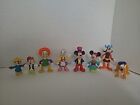 8 Disney Epcot Center. Small Toys Play figures 