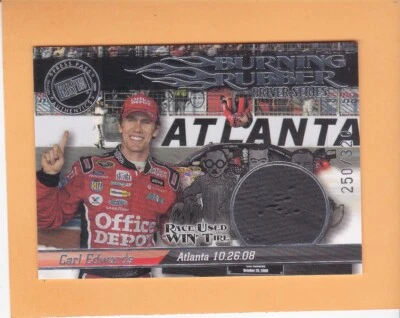 CARL EDWARDS 2009 PRESS PASS DRIVER SERIES BURNING RUBBER SP 320 WIN TIRE #BRD33 - Image 1 of 2