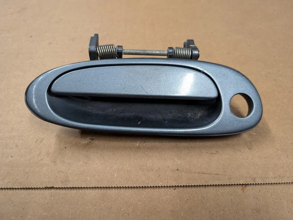 Manija de puerta del conductor plateada Lexus SC300 SC400 LH 1992-2000 Foto 1 de 1