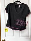 New With Tags Zumba Wear  Women’s Blanco And Pink  T shirt L Big Logo Round Neck