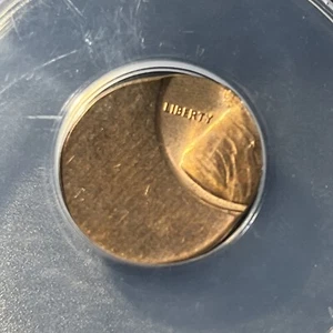(ND) 1C ERROR ANANCS MS 63 RB STRUCK 70% OFF CENTER AT K-1:00 LINCOLN PENNY - Picture 1 of 4