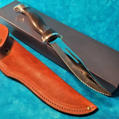 Cuchillo de caza Cutco 1769 KI funda de cuero hoja fija dentada doble D Foto 1 de 4