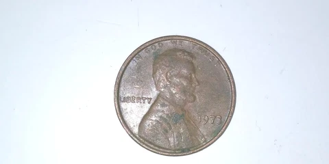 1973 Penny No Mint Mark Plus Errors in Liberty . And In God we trust.on Rim Cover