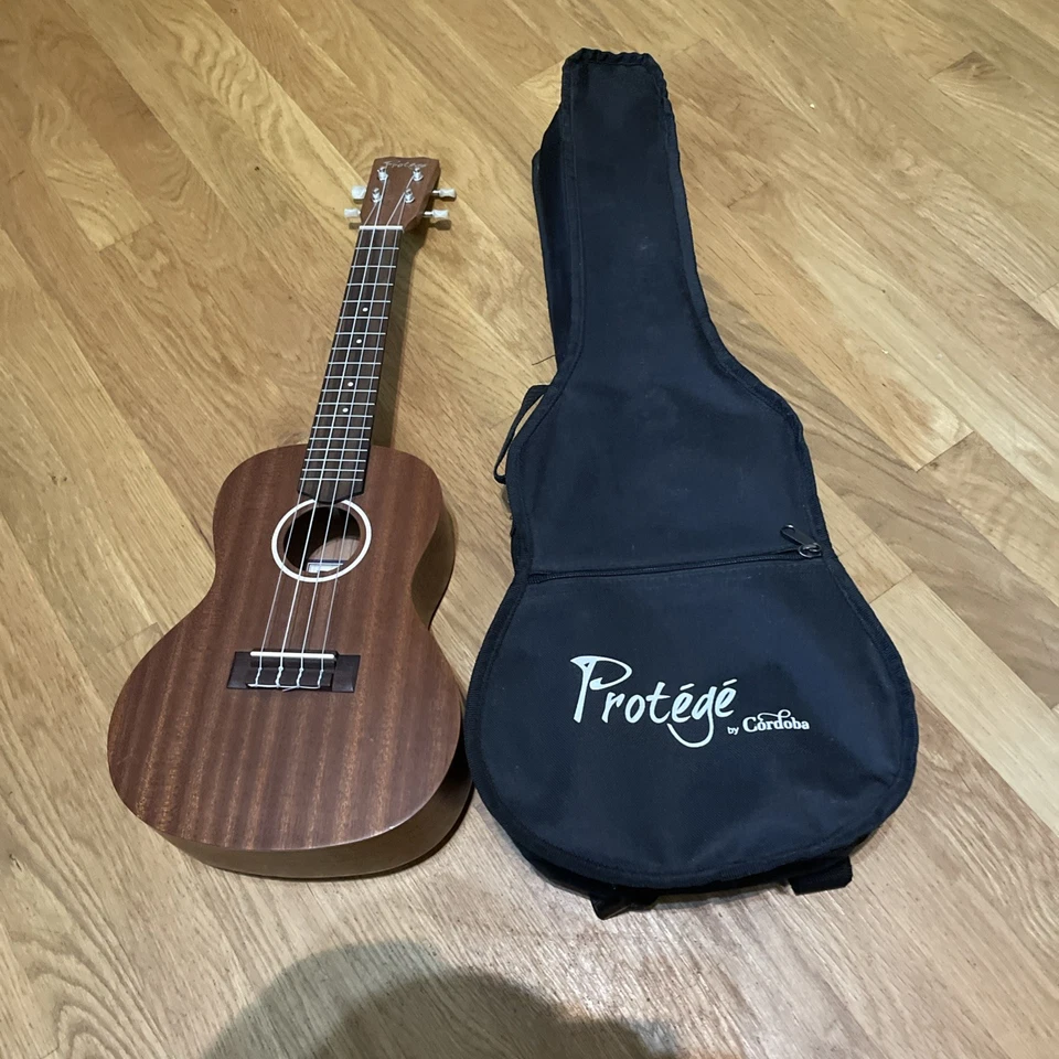 Ukele w/ Case:  Concert Size:Protege by Cordoba Model U100CM Excellent Condition - Image 1 of 4
