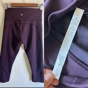 Lululemon In Movement Crop Everlux Purple Leggings Womens Size 8 W6AHJS EUC - Picture 1 of 13