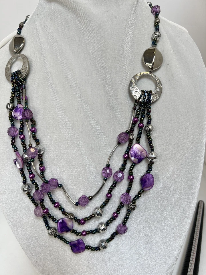 0737. Tonificado plateado con cristales morados y conchas.  Foto 1 de 1