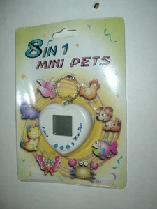 Gigapet Nanopet Giga Nano Pet Tamagotchi 8 PETS DINOSAUR DOG FISH CAT CRAB CHICK - Picture 1 of 1