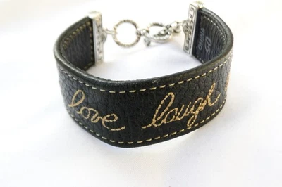 Brazalete Brighton Plata Cuero Negro Live Love Laugh Dream Toggle Foto 1 de 4