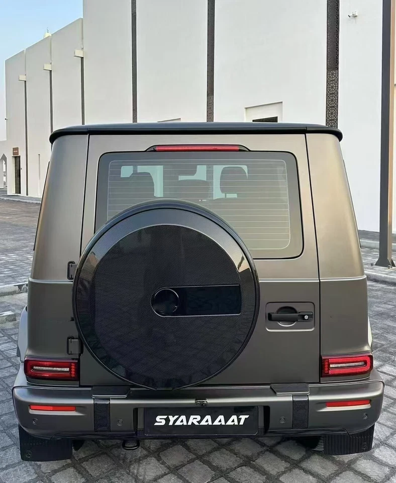 Cubierta de neumático de rueda de repuesto de carbono real para Mercedes Benz W463 G500 G550 G63 G65 Foto 1 de 4