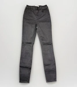 Pantalones de mezclilla Pacsun talla 24 negros semi elásticos tiro alto más delgados con bolsillo - Imagen 1 de 9