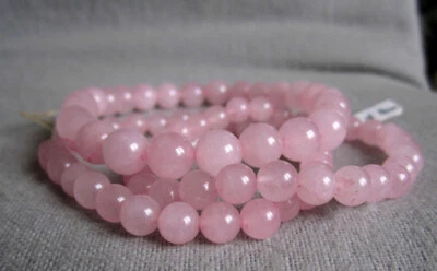 Armband aus Rosenquarz -  ca. Ø 6 und 8mm / 15-22 cm - elastisch - Bild 1 von 3