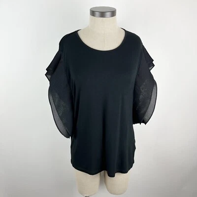 Blusa Essentials By Milano para mujer talla grande negra de gasa con volantes manga corta Foto 1 de 4