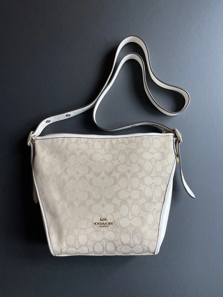 蔻驰 Duffelette 签名米色帆布皮革装饰斜挎包 - 全新带标签  — 第 1/1 张图片