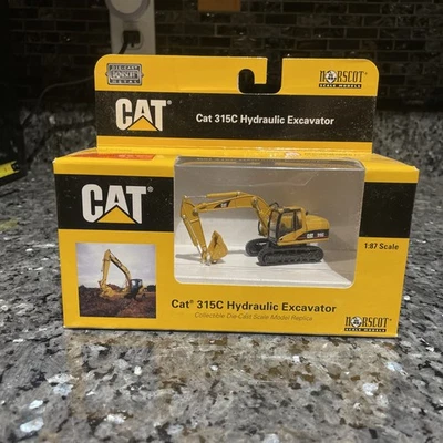 NORSCOT # 55107 CAT 315C HYDRAULIC EXCAVATOR - 1/87TH SCALE DIECAST MODEL  - Image 1 of 4