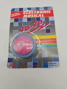 Vintage 1988 Electronic Musical Yo-Yo NOS versiegelt batteriebetrieben babyblau pink - Bild 1 von 4