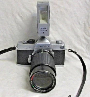 CÁMARA MINOLTA SR-7 DE COLECCIÓN con LENTE TOU/CINCO ESTRELLAS 75-210 mm y Kako II PARA EXHIBICIÓN Foto 1 de 4