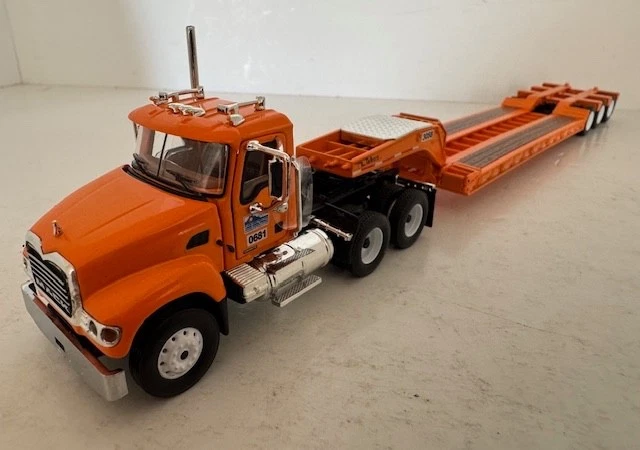 1:64 Colorado DOT Mack Granite Semi Truck & Tri-Axle Lowboy Trailer First Gear - Image 1 of 4