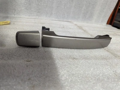 Manija puerta interior trasera izquierda lado conductor Nissan Máxima SL 2006 3,5 L Foto 1 de 3
