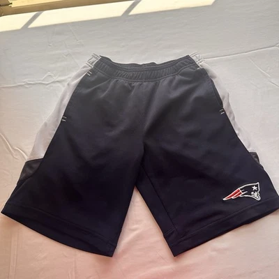 Ropa oficial del equipo de fútbol americano de los Patriots de la NFL pantalones cortos medianos* Foto 1 de 4