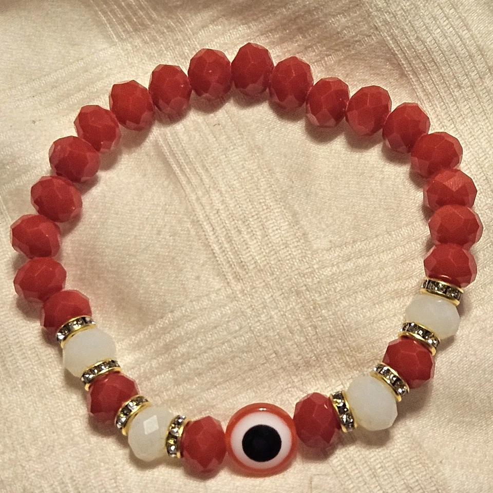 PULSERA CUENTAS ROJAS MAL OJO CON PEDRERÍA PROTEGE MANTIENE ALEJADO EL MAL ASPECTO HECHO A MANO Foto 1 de 1