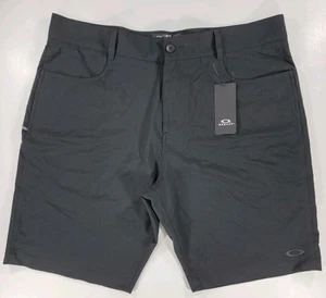 NWT Oakley Baseline Hybrid 21" 2.0 Shorts Men’s 40 Black Performance Stetch 10" - Picture 1 of 13