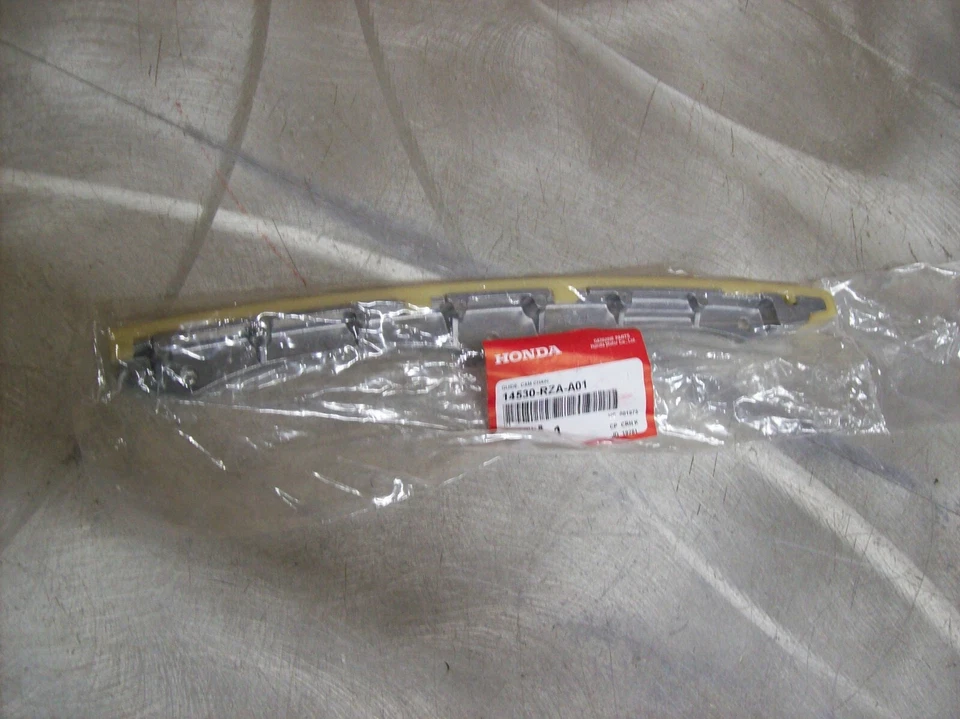 v7) Guía de cadena de distribución genuina OEM HONDA 14530-RZA-A01 Foto 1 de 1