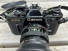 Canon AE-1 35mm SLR Film Camera with FD 50mm Lens - Silver