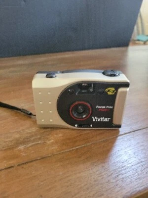 Cámara fotográfica panorámica Vivitar PN2011 35 mm dorada excelente estado  Foto 1 de 4