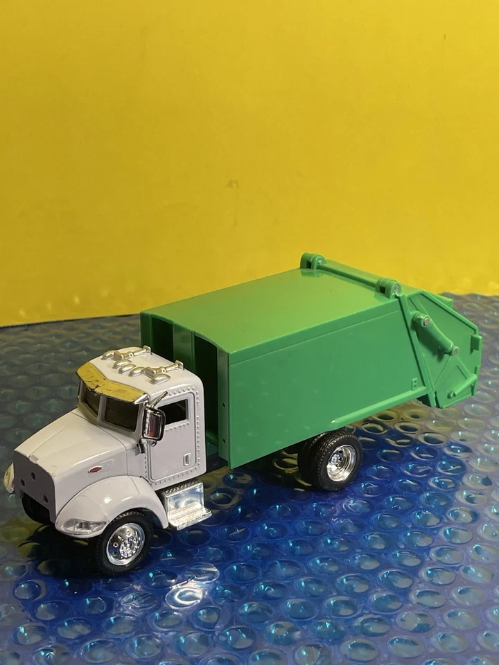 Long Haul Trucker Peterbilt Model 335 Garbage Trash Truck 1:43 Scale NewRay - Image 1 of 4