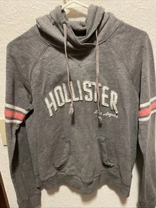 Sudadera con Capucha Hollister Para Mujer Talla L Gris Manga Larga Bolsillos Canguro Pullover Rayas - Imagen 1 de 10
