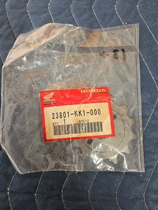 NOS Honda CR125 XR200 / 250R Genuine OEM Front Sprocket 13T Part # 23801-KK1-000 - Picture 1 of 3
