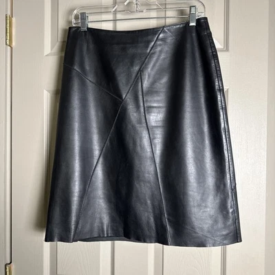 Falda deportiva de cuero negra para mujer VAKKO talla 8 diseño de retazos dobladillo crudo Foto 1 de 4