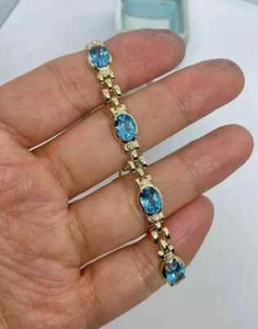 18Ct Oval Cut Lab Created Blue Topaz Tennis Bracelet 14K Yellow Gold Plated 7" - Picture 1 of 4