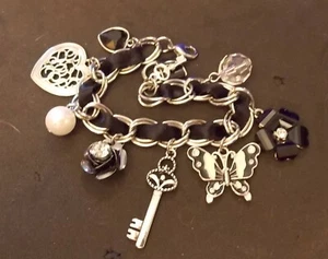 Black Ribbon bracelet 9 charms 7 1/4" silver tone gothic - Picture 1 of 5