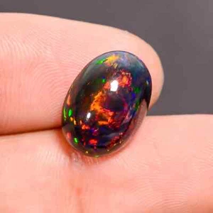 6x8 mm Natural Ethiopian Multi Fire Black Opal Oval Cabochon Loose Gemstone - Picture 1 of 3