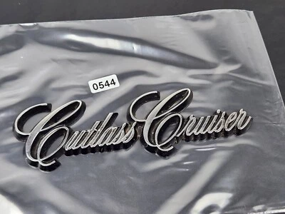 GM 560650 1978-81 Oldsmobile Cutlass Cruiser guardabarros delantero emblema 0544 A9 Foto 1 de 4