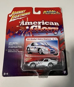 Johnny Lightning 65 Shelby Cobra Daytona American Glory nuovo - Foto 1 di 3