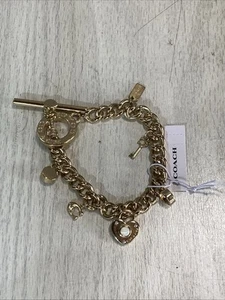 Nuevo Coach Perla Corazón Candado Dije Palanca Pulsera Precio Etiqueta $148 - Imagen 1 de 9