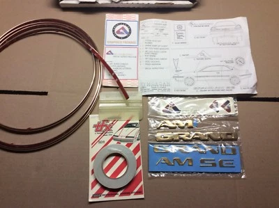 Pontiac Grand Am SE 1997 dorado edición All American equipamiento de gráficos Foto 1 de 4