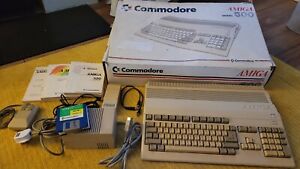 Commodore Amiga A500 Computer with A520 Mod cables and manuals 