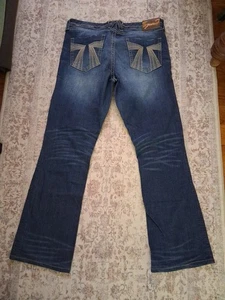 Pantalones de mezclilla para mujer SEVEN 7 desgastados bordados con bolsillos corte bota talla 14. - Imagen 1 de 13