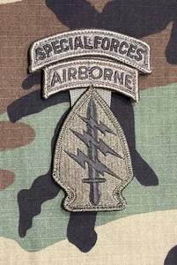 Parche/pestaña SF del Comando de las Fuerzas Especiales del Ejército de los Estados Unidos con gancho BDU OD verde sometido SFGA - Imagen 1 de 3