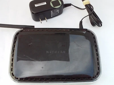 Netgear WNR1000 150 Mbps 4-Port 10/100 Wireless N Router with T012LF1209 Adapter - Image 1 of 4