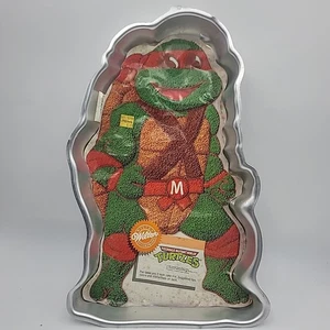 Sartén para pasteles vintage Wilton 1989 Teenage Mutant Ninja Turtle Miguel Ángel 2105-3075 - Imagen 1 de 4