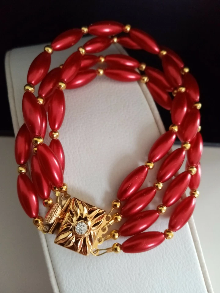 Schmuck Armband Oliven Perlen 4 reihig rot gold  mit Clip Verschluss 19 cm - Bild 1 von 3
